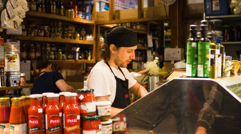 Cook preparing meals in a Canadian restaurant kitchen